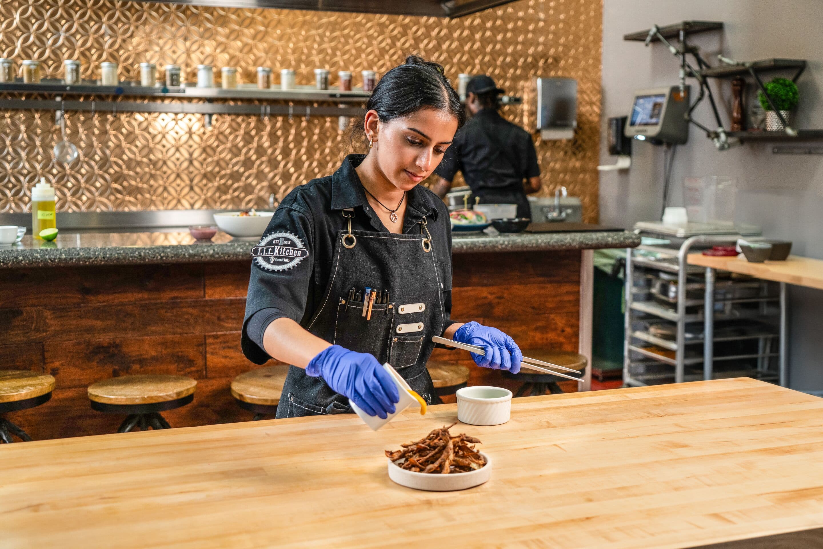 Chef Rick Green and this FIT kitchen team prepping Zero Waste Cookbook recipes, June 2025