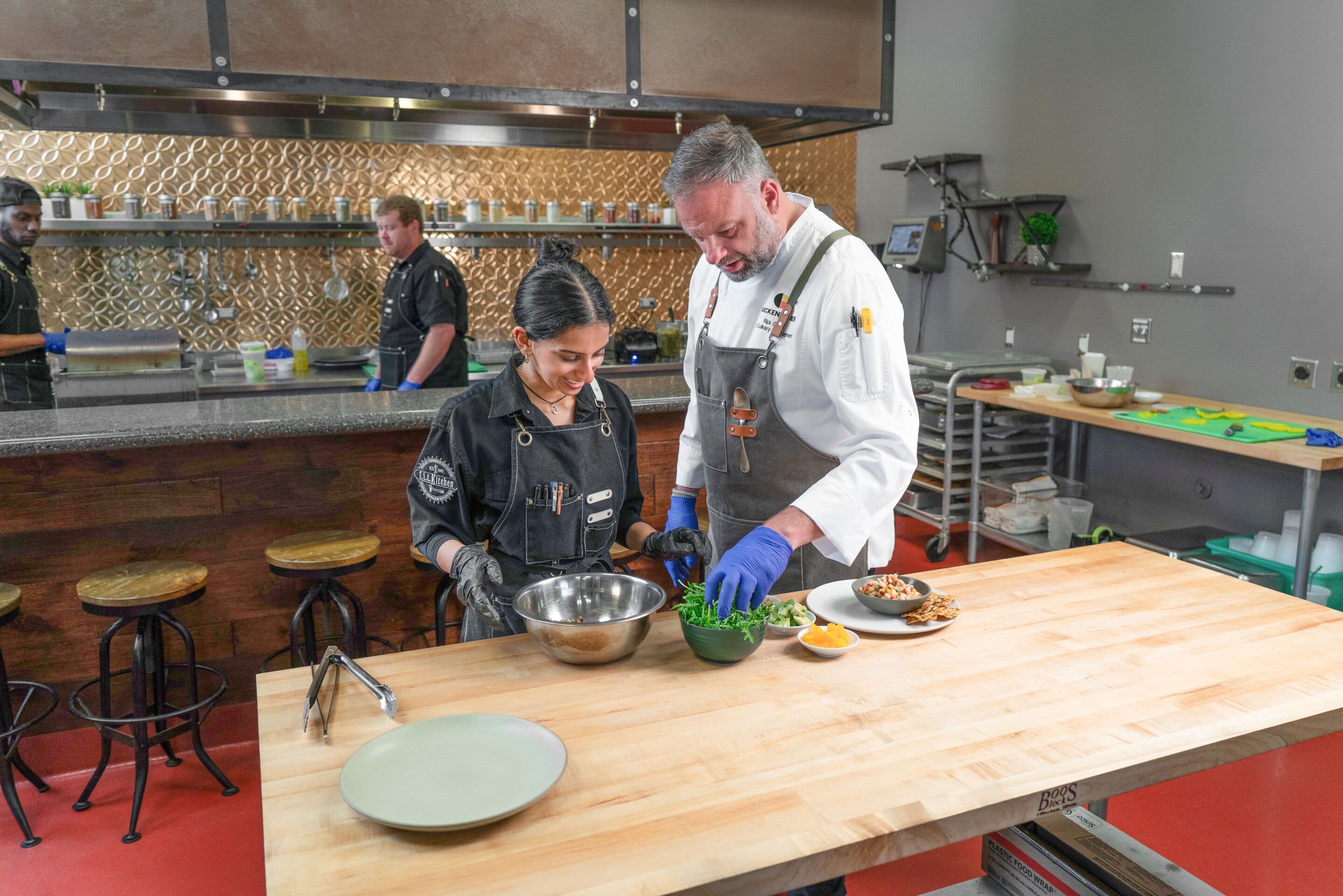 Chef Rick Green and this FIT kitchen team prepping Zero Waste Cookbook recipes, June 2025